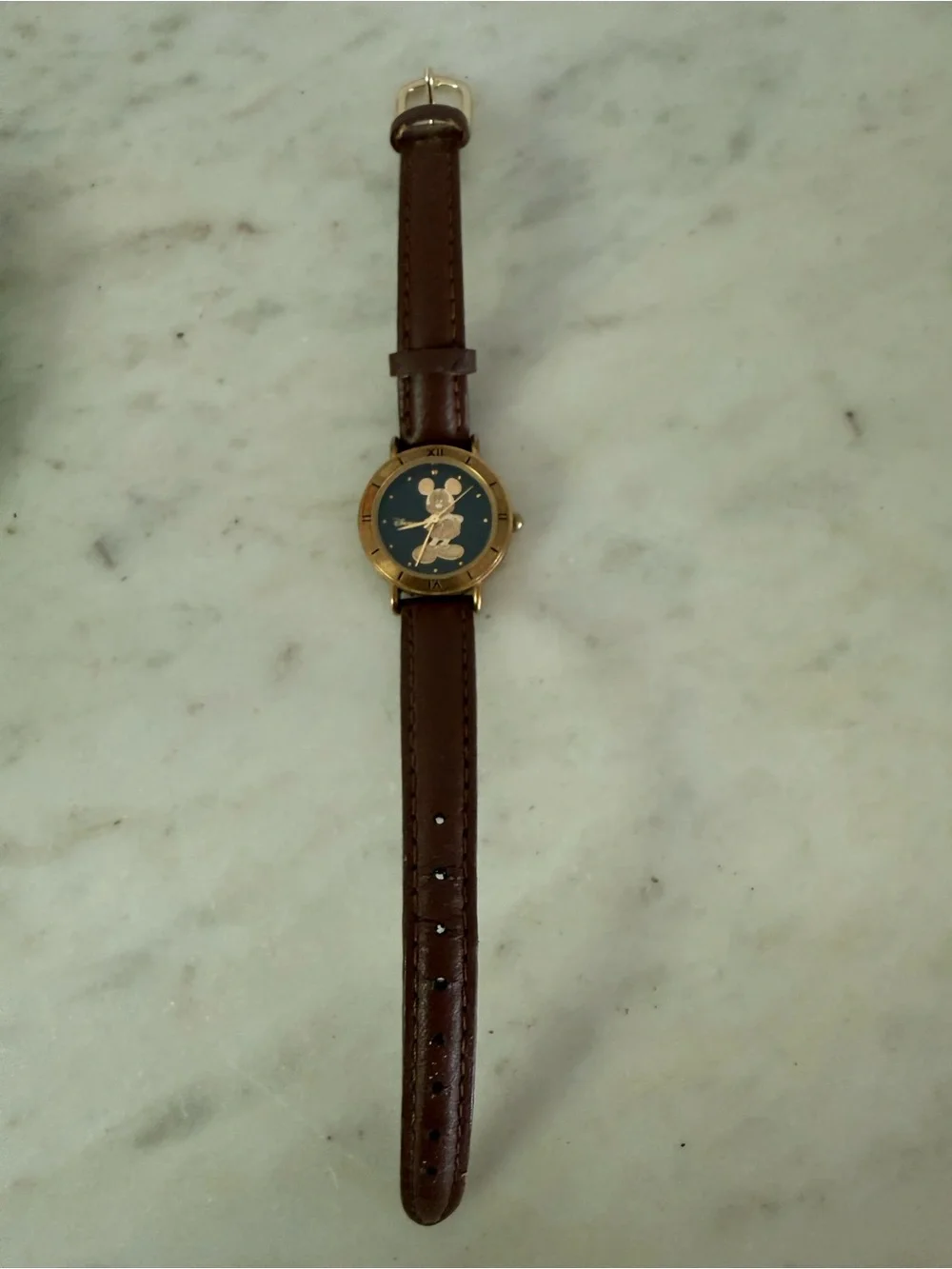 Disney gold tone